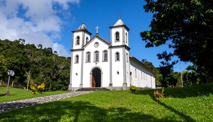 Fototapeta premium White church on a grassy hill