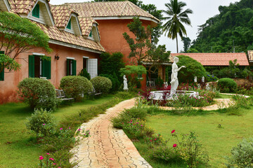  Walkway with angel statue in a garden