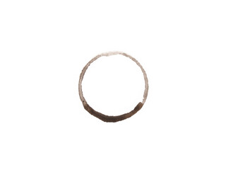 Coffee spill circle shape. A dark beverage stain forms a circular print with irregular details....