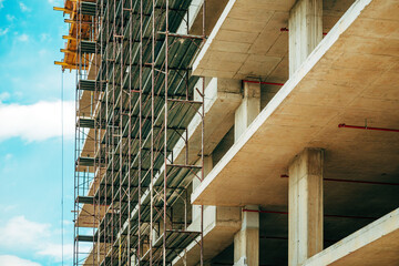 Reinforced concrete form structural building construction site with scaffolding