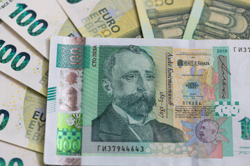 100 Bulgarian Lev Note on a Blurred Euro Background