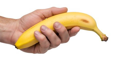 A Ripe Banana Held in a Hand Showing Natural Blemishes and Texture.