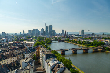 Frankfurt City Downtown, Residential Buildings, Bridges and Main River on Sunny Day. Wide Shot. Aerial View. Hesse, Germany