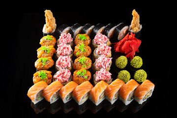 Sushi set with salmon, tuna, avocado, cream cheese and shrimp
