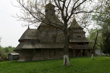 Ukraine Lviv region wooden churches on a cloudy summer day