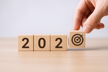 Setting Goals for the Future: Wooden Blocks Forming Number 202 and Target Symbol, Concept of New Year and Success