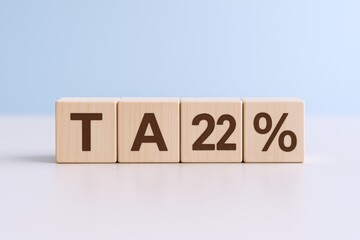 Tax Concept: Wooden Blocks Spelling TA 22 Percent, Illustrating Taxation, Finance, and Economic Impact