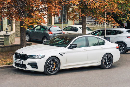 Almaty, Kazakhstan - July 14, 2025: White BMW M5 Competition in a city parking lot