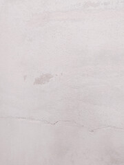 Subtle texture in neutral tones. A faded and slightly cracked wall for backgrounds, overlays, and visual metaphors of time, decay, or aging. Use in design for a vintage or grunge effect.