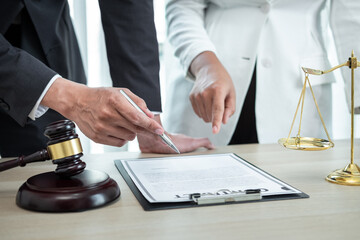 Professional Male lawyer or counselor discussing negotiation legal case with client meeting with...