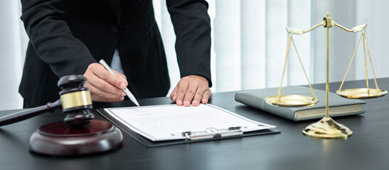 Female lawyer working with legal case document contract in office, law and justice, attorney,...