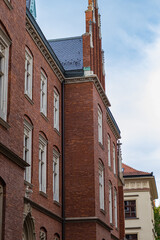 Side view of a historic Gothic university building