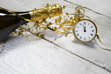 New Year concept, clock near to the midnight of 2026, white wooden background