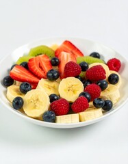 Colorful fruit salad in a white bowl (1)