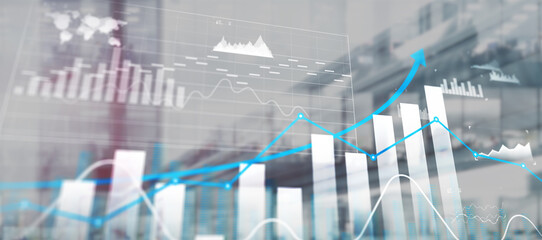 Graph showing financial growth, against a blurred city skyline background. Business city...