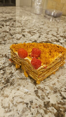 Naklejka premium Honey cake with raspberries 