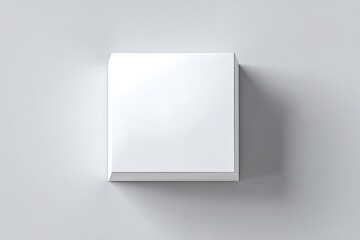 Overhead view of a blank, square, white box