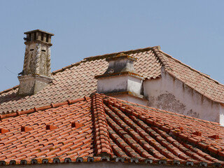 red, arched roof tiles, house on the Algarve coast