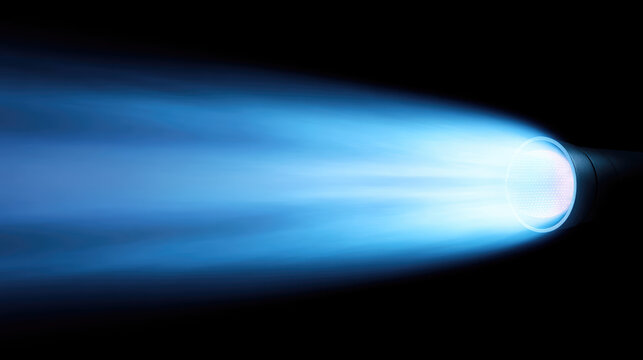 A bright blue beam of light is emitted from a flashlight in a dark setting. Concept: illumination, focus, energy, light