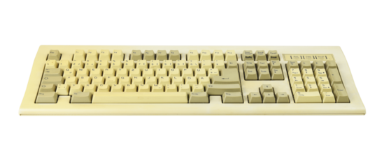 Vintage computer keyboard from the 1990s isolated on white background.