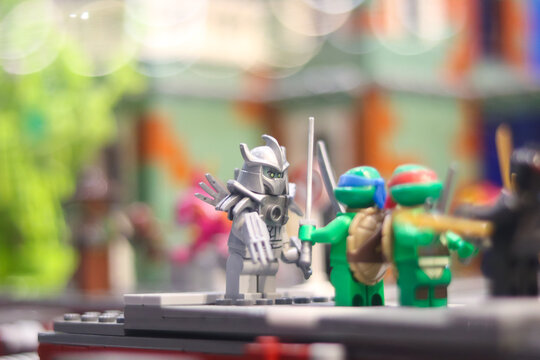 Colorful toy scene with ninja turtles and silver character