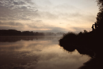 sunrise over the foggy river in Toruń © Przemylsaw Budzynski