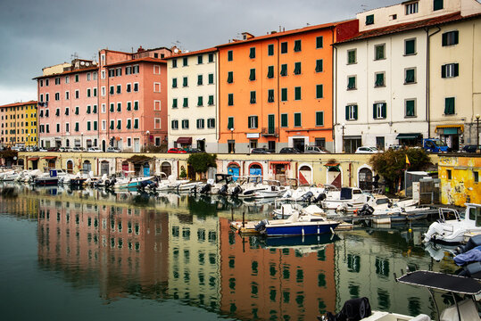 Fototapeta A canal so called "fossi with moored boats in the Venezia Nuova, Livorno, Italy