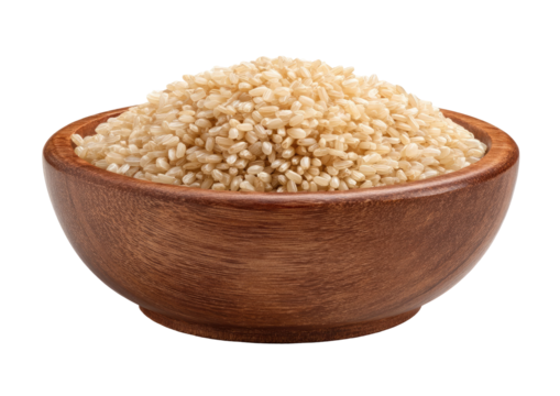 Uncooked rice in a wooden bowl