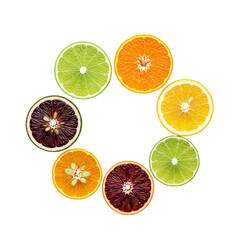 Fototapeta premium Vibrant citrus slices arranged in a circular pattern