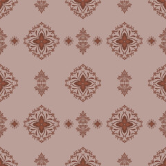 Seamless vintage damask pattern in red on pink background, elegant ornamental floral design for wallpaper, fabric, and home decor.