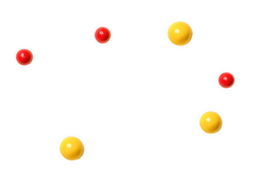 Red and yellow candies scattered on a transparent background