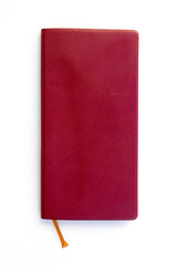 A red leather diary blank cover, notebook isolated on white background