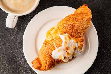 Croissant almond freshly baked sweet dessert tasty snack fresh delicious gourmet food background on the table  rustic food top view copy space