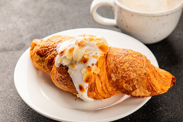 Croissant almond freshly baked sweet dessert tasty snack fresh delicious gourmet food background on the table  rustic food top view copy space