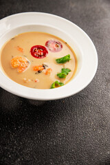 Tom kha soup shrimp, coconut milk, miso paste tasty seafood snack fresh delicious gourmet food background on the table rustic food top view copy space pescetarian diet