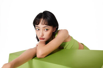 Female Model Posing with Green Background.