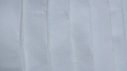Papier pozginany rozerwany ułożony