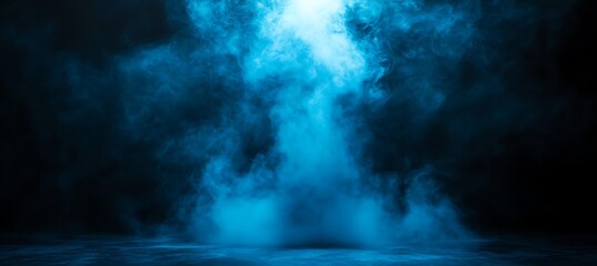 A bright beam of ethereal blue light shines down through swirling mystical smoke and mist creating an atmospheric and dramatic effect on a dark background