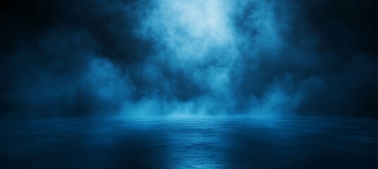 Obraz premium Mysterious blue light beam pierces through atmospheric fog and smoke illuminating a dark reflective surface below