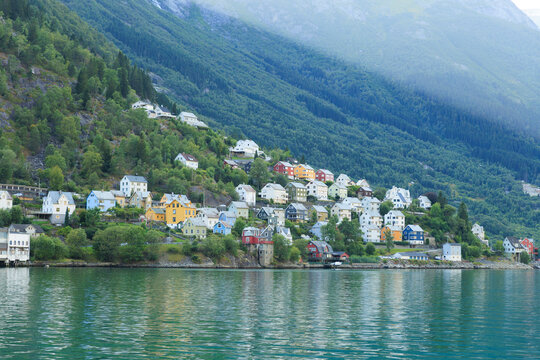 Colorful small houses on the mountain in Odda