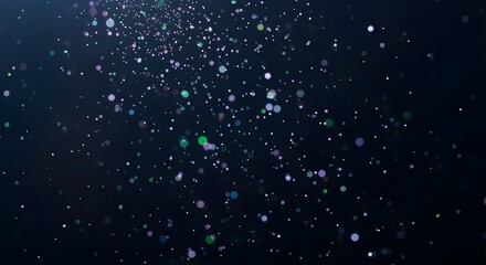 Fototapeta premium Close-up of shimmering particles floating in the air against a dark backdrop