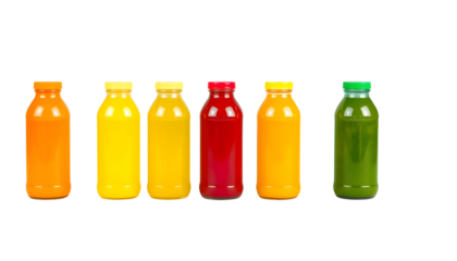 Colorful fruit juice bottles lined up, ready to be enjoyed.