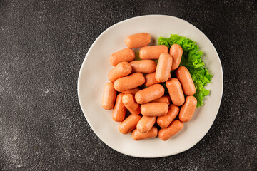 Mini sausages fresh delicious processed meat tasty snack fresh delicious gourmet food background on...