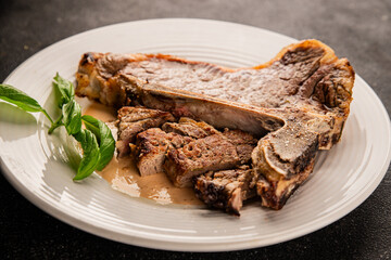 t-bone steak roast cut of meat juicy roast beef tasty snack fresh delicious gourmet food background on the table rustic food top view copy space
