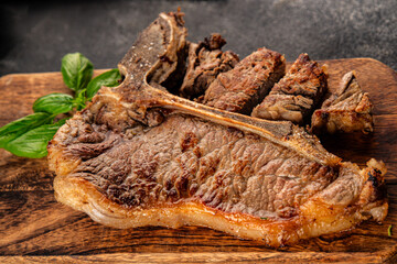 t-bone steak roast cut of meat juicy roast beef tasty snack fresh delicious gourmet food background...