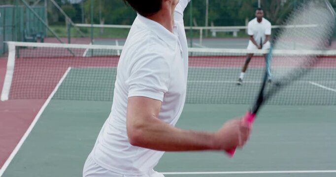 Bouncing ball prompting diverse male tennis players serving, sprinting on hard court with racquets