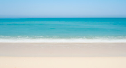 Serene Coastal Scene: Soft Blue Ocean Waves on Pristine White Sand Beach, Tranquil Summer Seascape