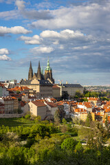 Fototapeta premium Prague Castle dominating the cityscape under a cloudy sky in Spring