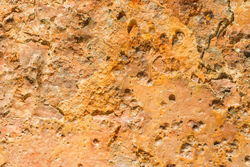 Rough orange wall texture background