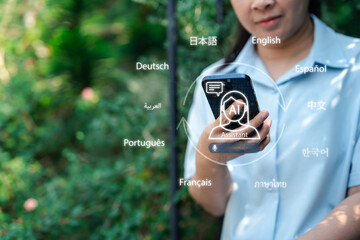 Modern speech recognition technology and language innovation concept. Woman using AI voice assistant on smartphone with multilingual interface for translation and global education communication.